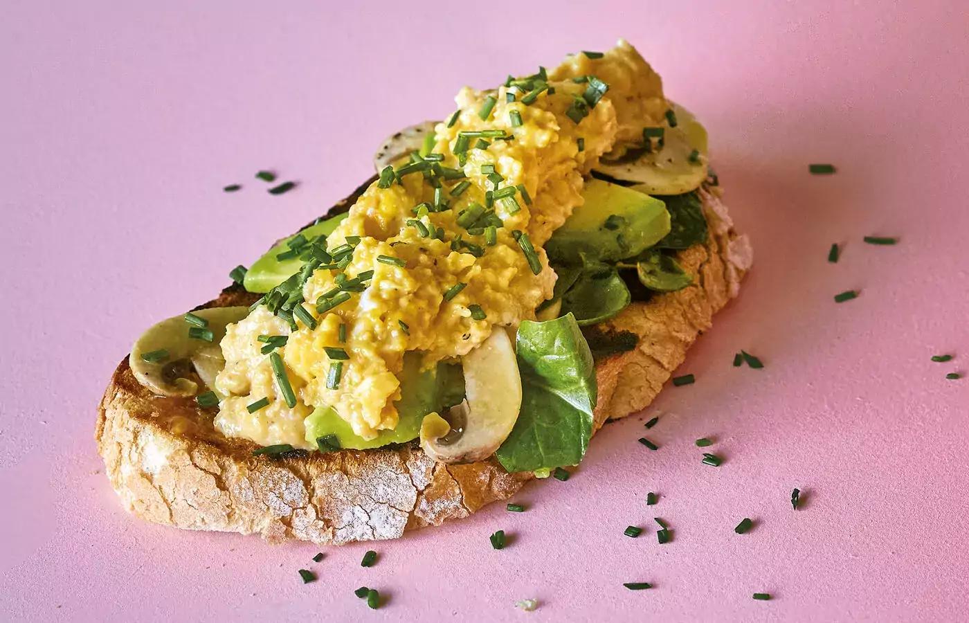 Scrambled eggs with avocado and whole wheat toast