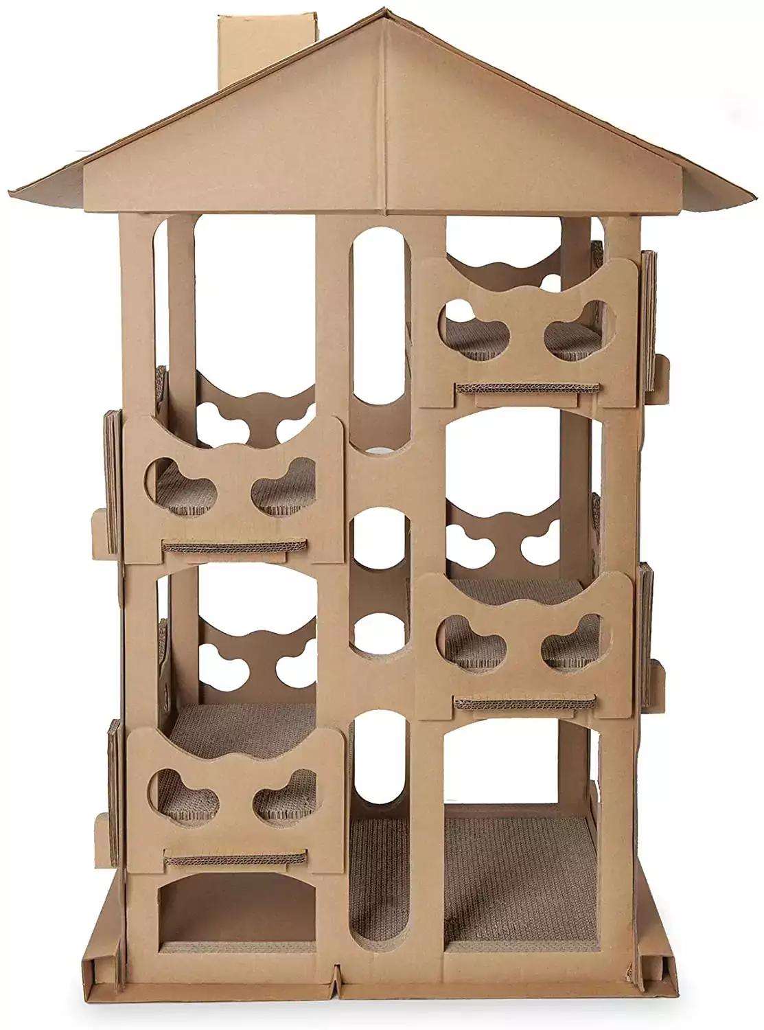 Casa de juegos de papel corrugado para gatos
